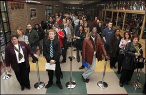Job seekers attend a recent Job Fair at Owens Community College.