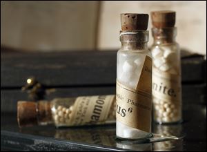 Bottles of medicine are displayed as part of 