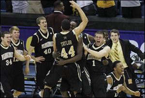 Members of the Vanderbilt team celebrate their 71-64 win over Kentucky in the championship game of the 2012 Southeastern Conference tournament at the New Orleans Arena on Sunday.