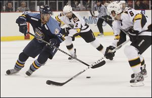 Todd Griffith, left, was acquired in trade in January. So far he has scored 10 goals in 21 games with the Walleye to go along with six assists. 