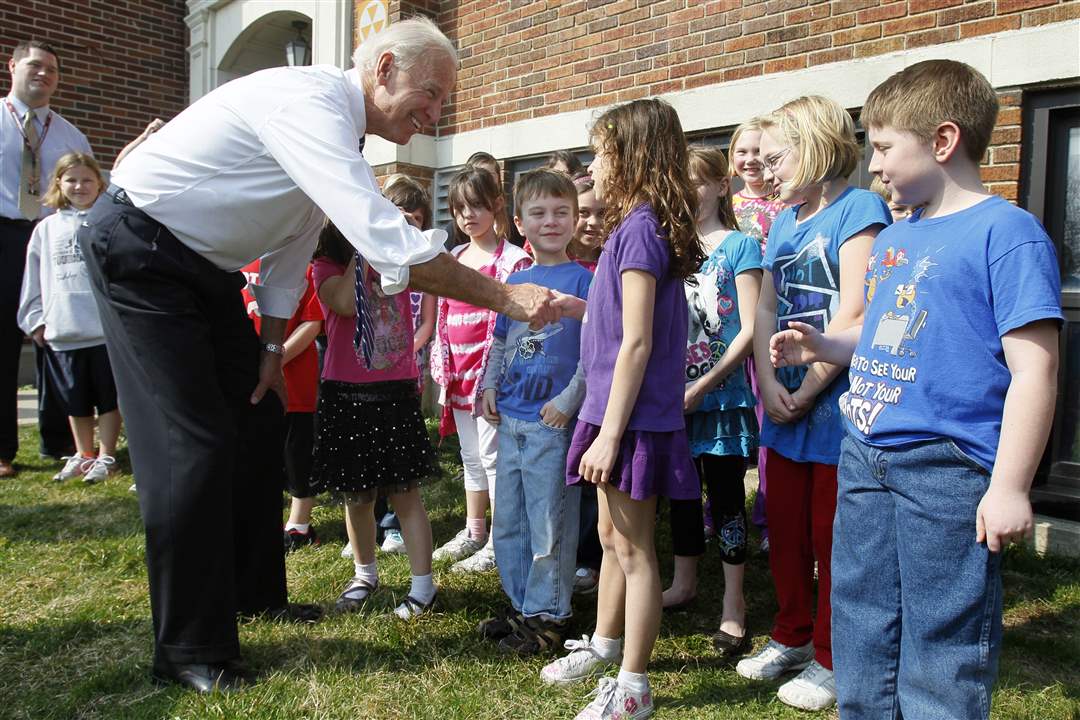 biden-shakes-hands-with-students