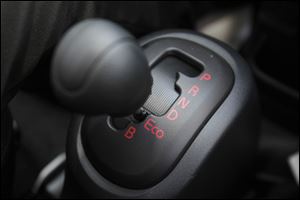 The small, electric Mitsubishi i-MiEV has a gear labeled Eco, in which acceleration is reduced to save power.
