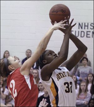 Senior forward Michelle Holmes averages 12.3 points and 12.2 rebounds.