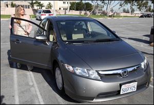 Heather Peters says her 2006 Honda Civic Hybrid never achieved the gas mileage Honda claimed in its advertising.
