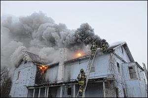 Toledo fire crews themselves reported a house fire at 712 Buffalo Street in North Toledo. The blaze was one of seven house fires reported in the city from early Saturday through Monday morning.
