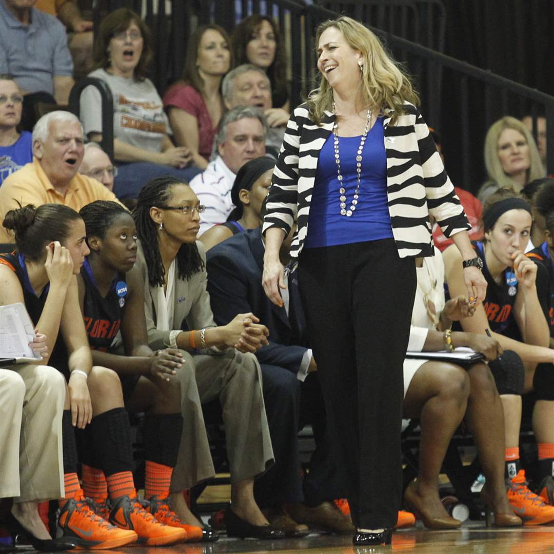 Florida-head-coach-Amanda-Butler-laughs-after-a-technical