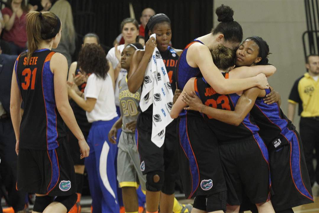 Florida-hugs-after-losing-to-Baylor