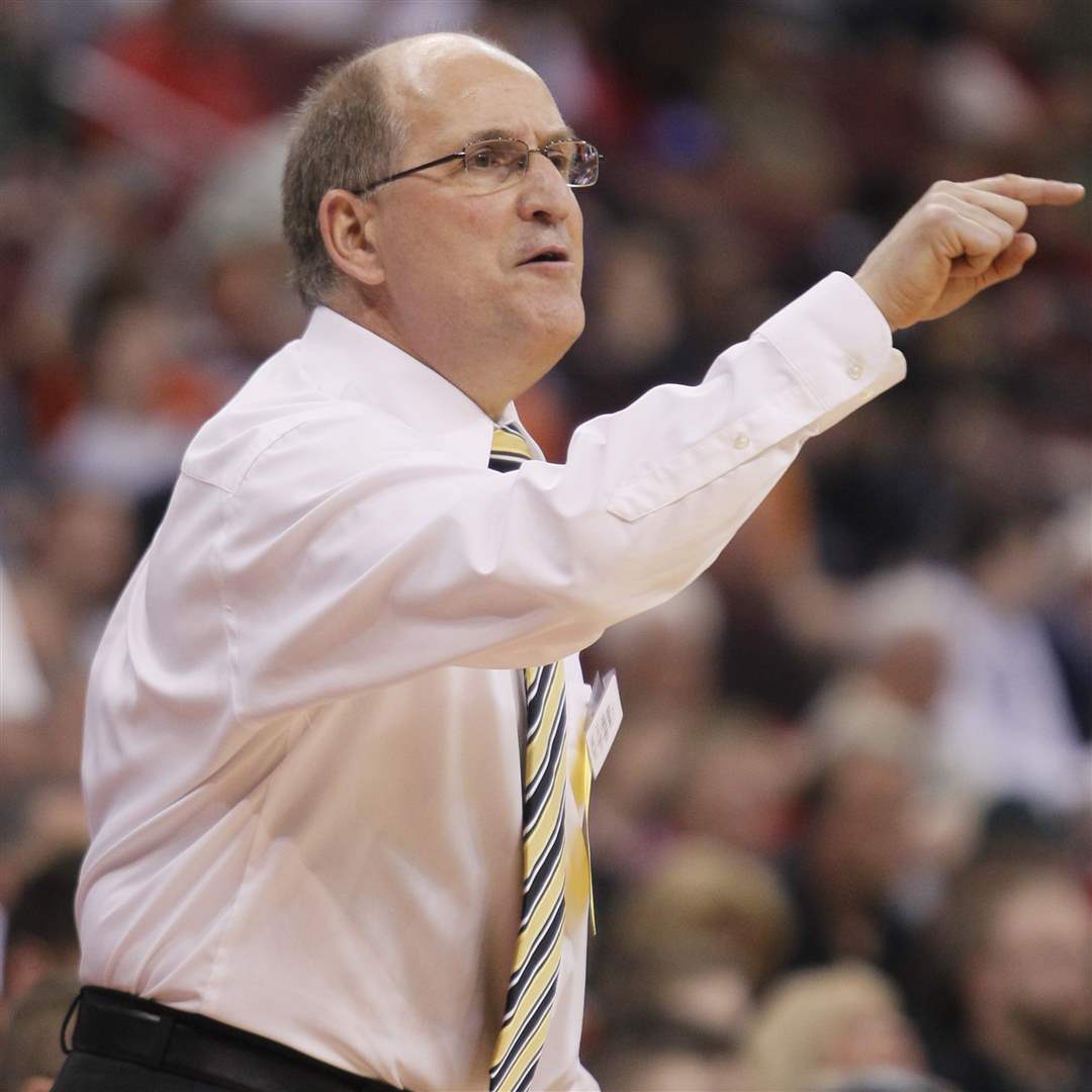 Whitmer-head-coach-Bruce-Smith-shouts-instructions-against-Pickerington