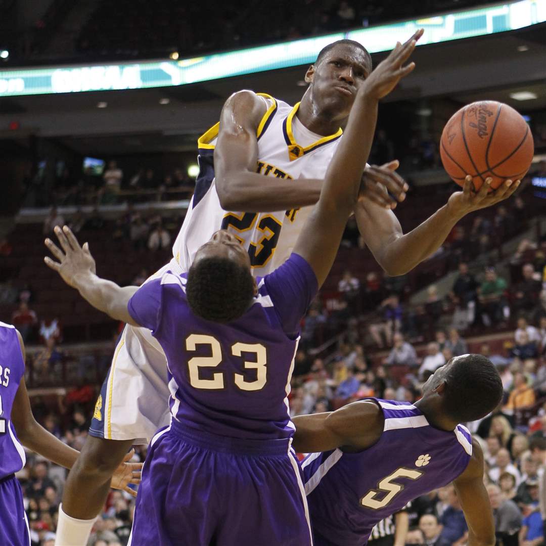 Whitmer-s-Nigel-Hayes-23-plows-over-Pickerington-s-Jae-Sean-Tate