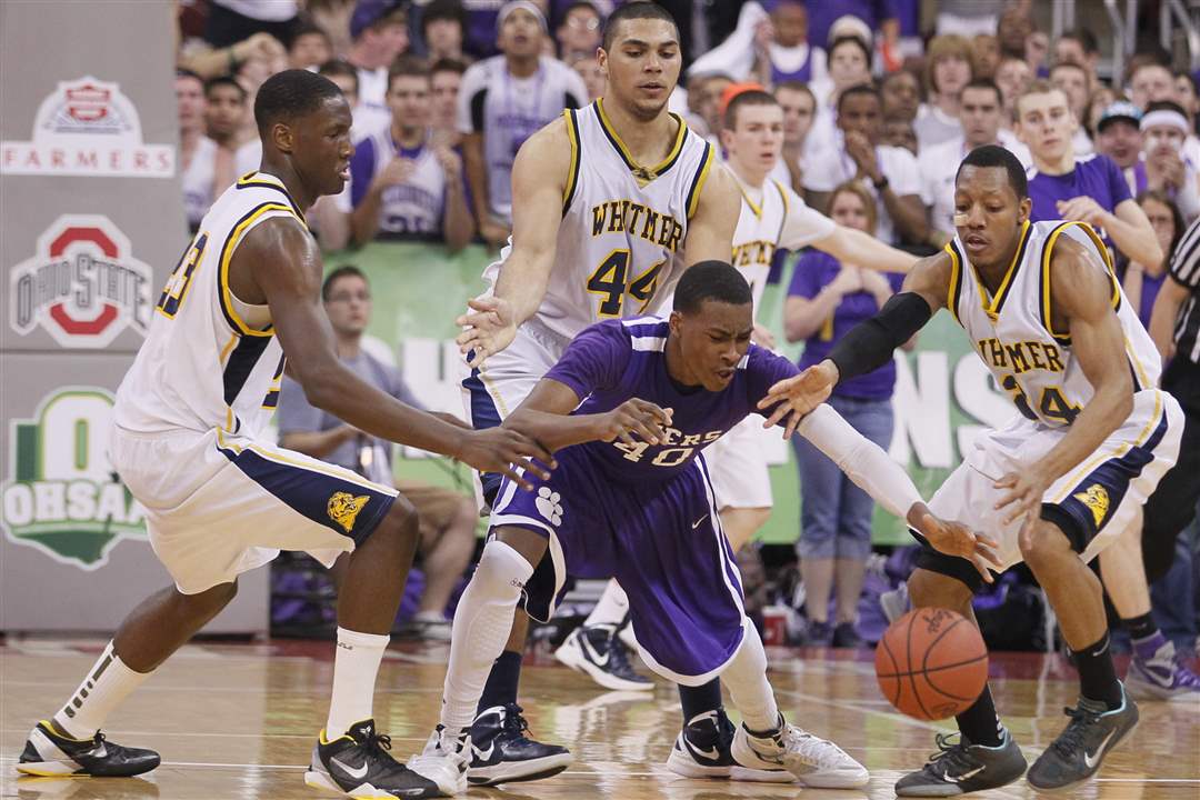 Whitmer-s-Nigel-Hayes-23-Chris-Wormley-44-and-Leroy-Alexander-24