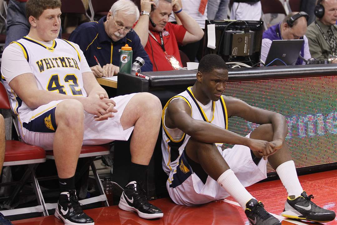 Whitmer-s-Storm-Norton-42-and-Nigel-Hayes-23-react