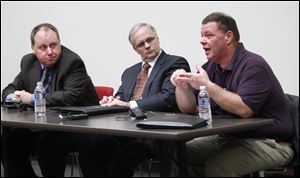 Panelists for a forum on Thursday are, from left, Dave Kielmeyer, senior director of communications for Bowling Green State University; Brian Trauring, WTVG executive news director; and Bill Gergich, a citizen who objected to the airing of the dash cam video of the wrong way crash on I-75 that killed three BGSU students and the driver of the wrong way car. They discussed the showing of the state tropper's dash cam video