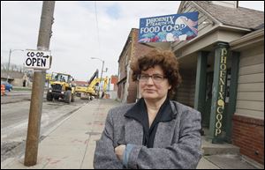 Lisa Blake, general manager of Phoenix Earth Food Co-op, says the store on West Sylvania Avenue might not survive the two-year construction project, which is scheduled to end by late August.
