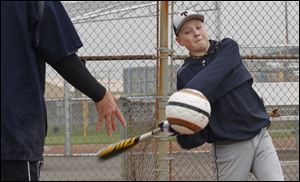 Cody Bartels of Perrysburg got outdoors Sunday to work on his swing at the Lucas County Recreation Center in Maumee.