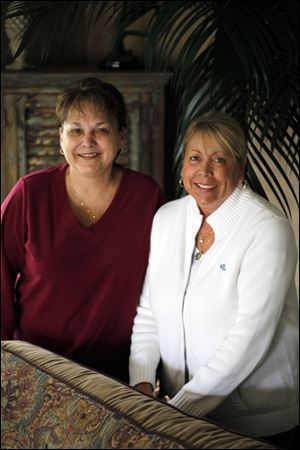 Mary Hammond, left, and Kathy Rollison, right, on March 25, 2012. The sisters received the dog tags of their father WWII solider John W. Sackett after nearly 70 years in the ground, the dog tags were sent  to them from a woman in Australia.