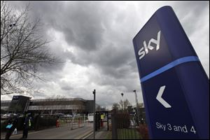 The entrance of one of the BSkyB headquarter buildings complex in west London is seen Tuesday.