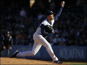 Mud Hens starting pitcher Adam Wilk fires in a pitch during the fifth inning against the Indians.