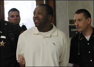 Anthony Belton is escorted from court after hearing that he faces death by lethal injection for the 2008 killing of Matthew Dugan, a gas station clerk. All capital cases are automatically appealed to the Ohio Supreme Court.
