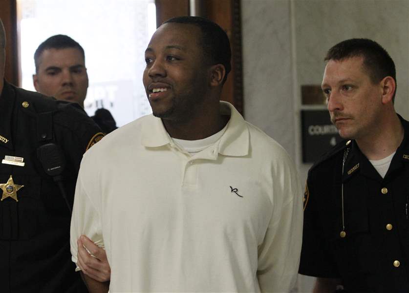 Anthony-Belton-is-escorted-from-court-after-hearing