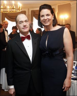 Allan Block, chairman of Block Communications Inc., parent company of The Blade, and his wife, Susan Block, pause during the sumptuous dinner.