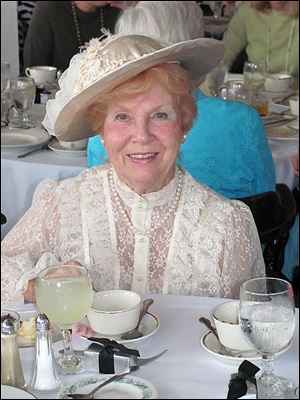Kim Swirbul enjoys tea and lemonade at Historic Perrysburg's Titanic remembrance. 