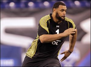 Offensive tackle Mike Adams, a former Ohio State player, has been selected in the second round of the NFL Draft by the Pittsburgh Steelers on Friday.