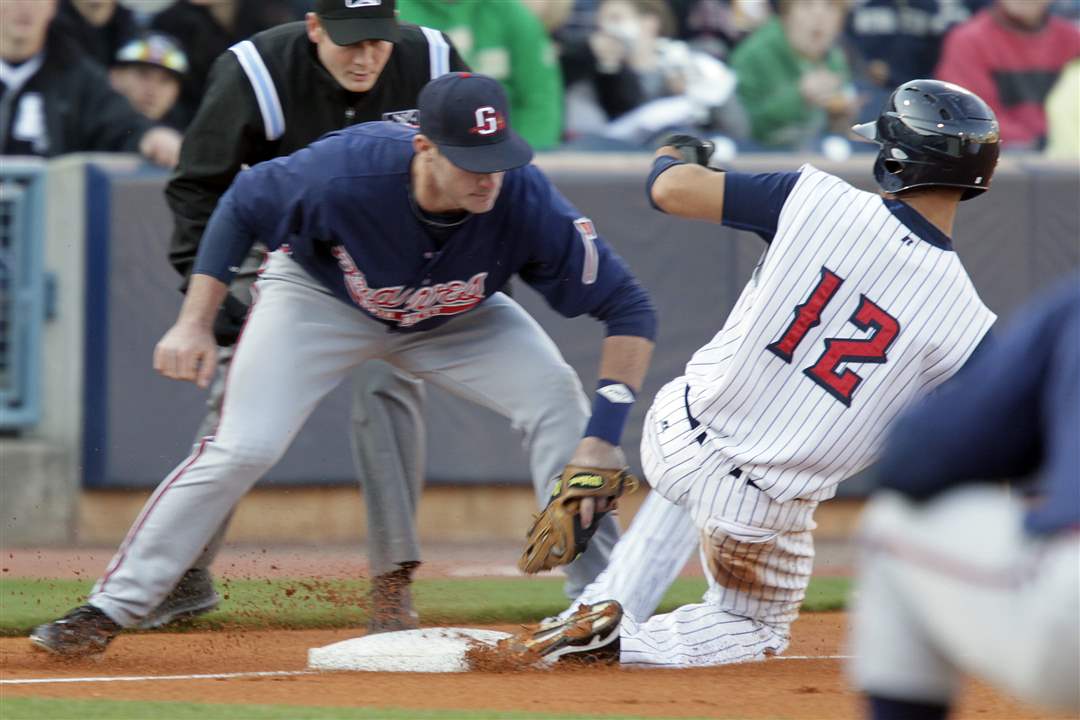 Gwinnett-s-third-base-player-Joey-Terdoslavich-tags-out-Quintin-Berry-1