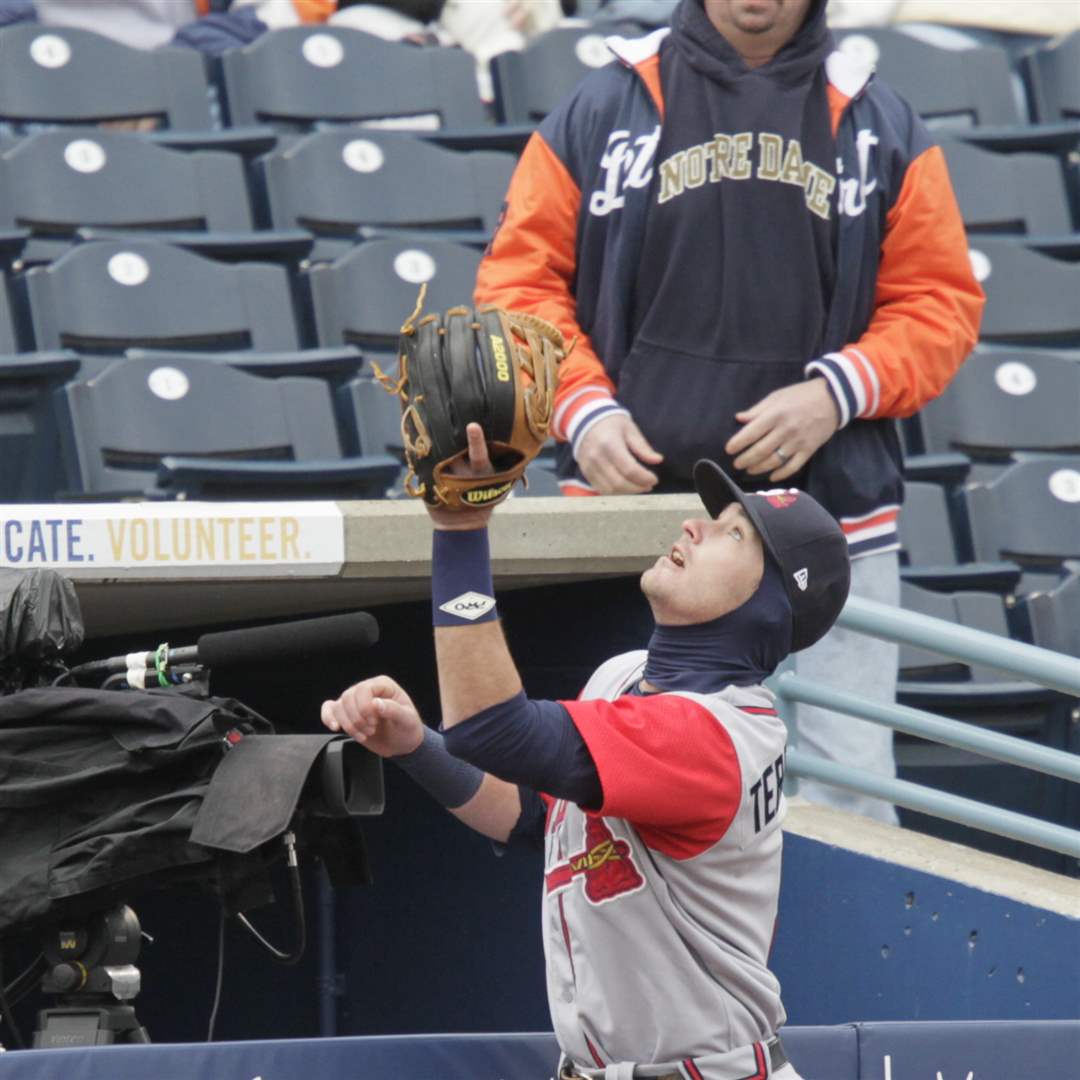 Gwinnett-s-third-base-player-Joey-Terdoslavich-catches-a-fly