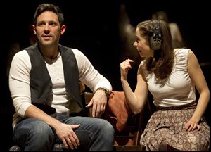 Steve Kazee, left, and Cristin Milioti appear in a scene from 