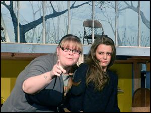 Mandy Burris and Kayla Hunter appear in a scene from the Fremont Community Theatre production of 'The Secret Garden,' opening Saturday.