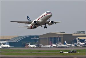 A Sukhoi Superjet-100 takes off from Halim Perdanakusuma airport in Jakarta, Indonesia, Wednesday, May 9, 2012 on it's second demonstration flight of the day. The Russian-made Sukhoi jet plane with 45 people on board, including eight Russians and an American, went missing during this flight near Jakarta, Indonesian government officials said Wednesday.