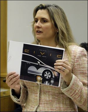 Heather Peters said Honda asserted her hybrid Civic would get 50 miles a gallon, but it fell short. 