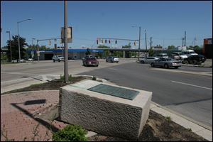 The Great Trail marker at Detroit and Cherry commemorates the Native Americans' wilderness path between Detroit and Pittsburgh.