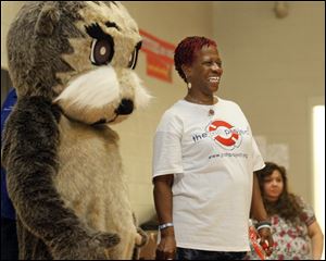 Wanda Jean Butts is joined by mascot ‘Josh the Baby Otter.'