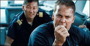 Tadanobu Asano, left, and Taylor Kitsch in a scene from 'Battleship.'