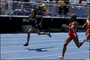 Notre Dame's Jessika Matthews sprints toward the finish to win the 400-meter dash in 59.07, lifting the Eagles to the overall team title.