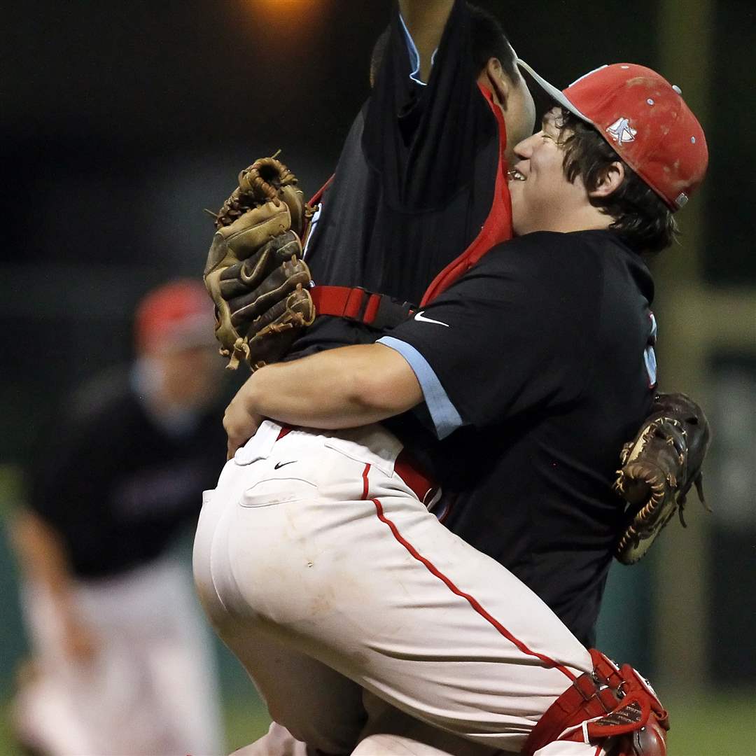 Bowsher-pitcher-Jake-Almanza-5-right-celebrates-winning-the-City-League-baseball-championship-game