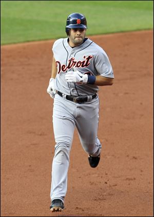 The Tigers' Alex Avila runs the bases after hitting a three-run home run in the second inning.