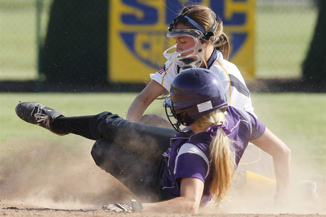 nda-softball-tags-out-born