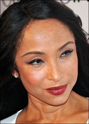 Sade Adu.