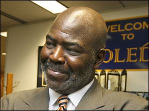 Mayor Mike Bell says a woman found in a house where a man died is not a relative.