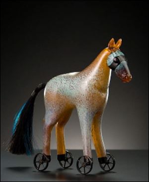 Blue Scooter Bandit by Shelley Allen Muzylowski is part of Hot Glass 2012 at the Edison Building.