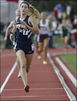 Notre Dame’s Lexi Aughenbaugh runs to the finish line to win the 3200-meter run at the Division I state track meet. She finished in a personal-best time of 10:44.58.