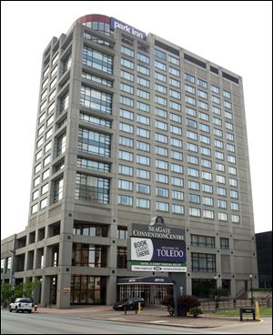 The Park Inn was built as an upscale Radisson hotel in 1987 at a cost of $42 million. It soon ran into financial troubles, and in 2006 it was rebranded as a midscale Park Inn.
