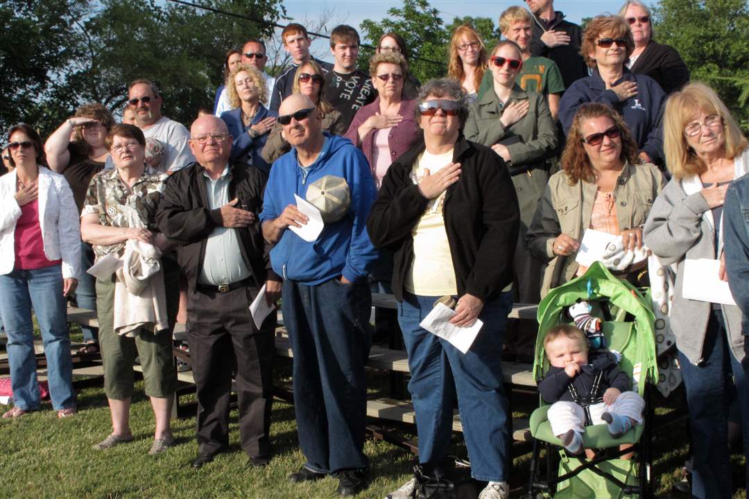 People-attend-a-memorial-service