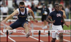 Archbold senior Danny Young races to a victory in the 300-meter hurdles in the Division II state meet in Columbus. Young had a winning time of 38.00.