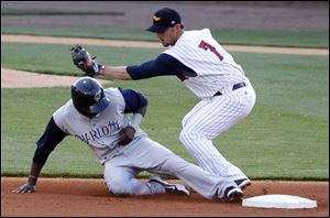 Hens second baseman Ryan Raburn can't make the tag in time as Charlotte's Justin Greene steals second in the fifth inning.