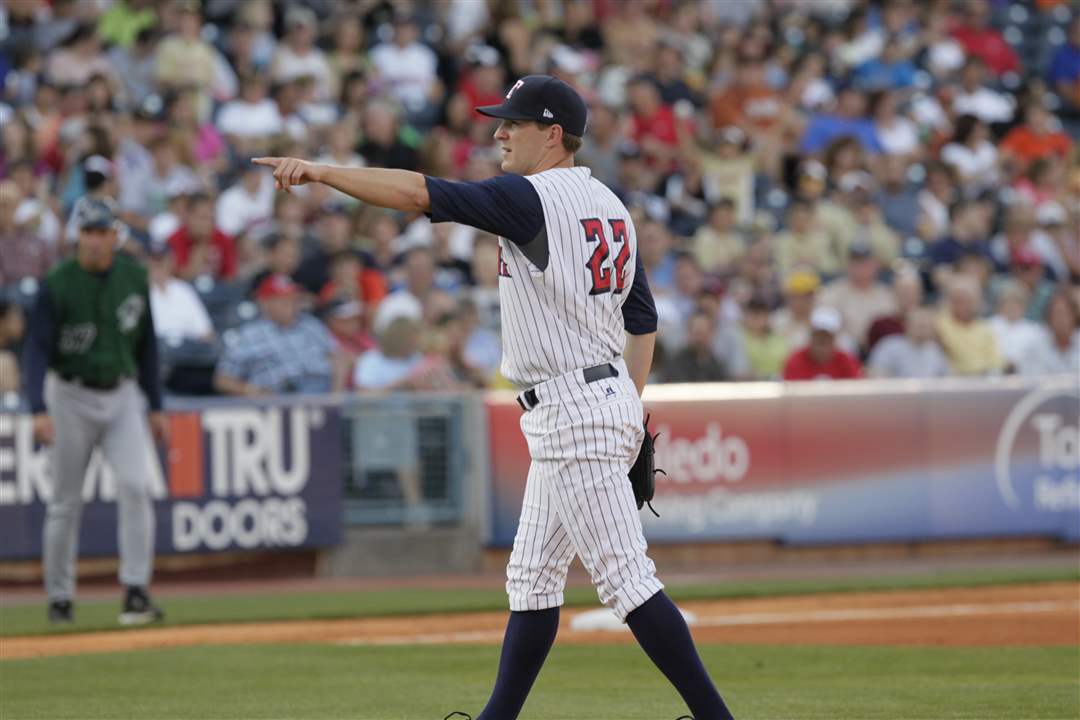 Hens-starting-pitcher-Adam-Wilk-directs-catcher-Rob-Brantly