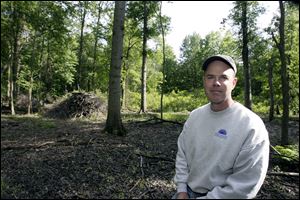 Jon Cross is restoring eight acres to native Oak Openings
species of plants at his home in Whitehouse.