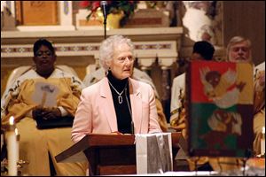 Sister Nancy Westmeyer, shown at Christmas Eve Mass at Toledo's St. Martin de Porres Church last year, has had to cut back on some activities as she fights a rare form of cancer. She says the prayers and support she has received have made her journey easier.